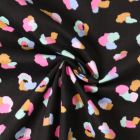 Tissu Jersey Bord Côte Mila motif léopard multicolore sur fond Noir profond