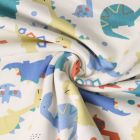 Tissu Sweat léger French Terry Léon dinos Bleus sur fond Blanc cassé