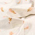 Tissu Jersey Coton Plumes pailletées sur fond Blanc chiné