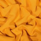 Tissu Jersey Coton envers molletonné uni Bio Jaune curcuma - Par 10 cm