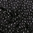 Tissu Jersey Coton Bio Pointillés blancs sur fond Noir - Par 10 cm