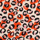 Tissu crêpe imprimé Large tache léopard orange noire et rose sur fond Beige - Par 10 cm