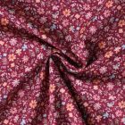 Tissu Popeline de Coton  Mélusine motif floral multicolore sur fond Prune