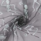 Tissu Tulle souple  Morgana squelettes paillettes argentés et irisés sur fond Noir