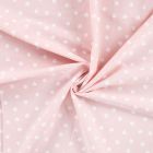 Tissu Popeline de Coton  patounes blanches Zumi sur fond Rose clair