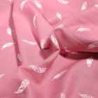 Tissu Coton imprimé Petites plumes sur fond Rose - Par 10 cm