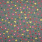 Tissu Jersey Coton Feuilles  et fleurs jaunes rose et vertes sur fond Gris foncé - Par 10 cm