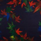 Tissu Caban Laine Feuilles orange et vertes sur fond Bleu marine - Par 10 cm