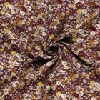 Tissu Crêpe de Viscose Bérengère fleurs Blanches sur fond Aubergine