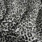 Tissu Sweat léger French Terry Maïa extensible léopard Noir sur fond Blanc