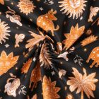 Tissu Popeline de Coton  Cassiopée motif cosmique Ocre intense sur fond Noir profond