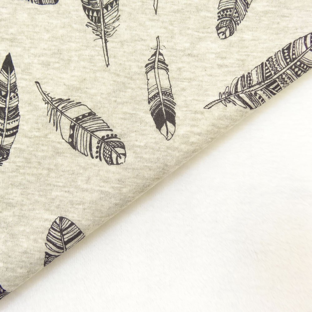 Tissu Sweat envers minky Gris blanc chiné Plumes Noir