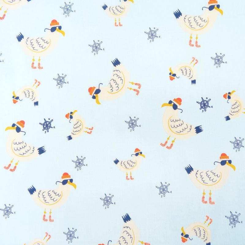 Tissu Coton Bleu Mouettes beiges et jaunes