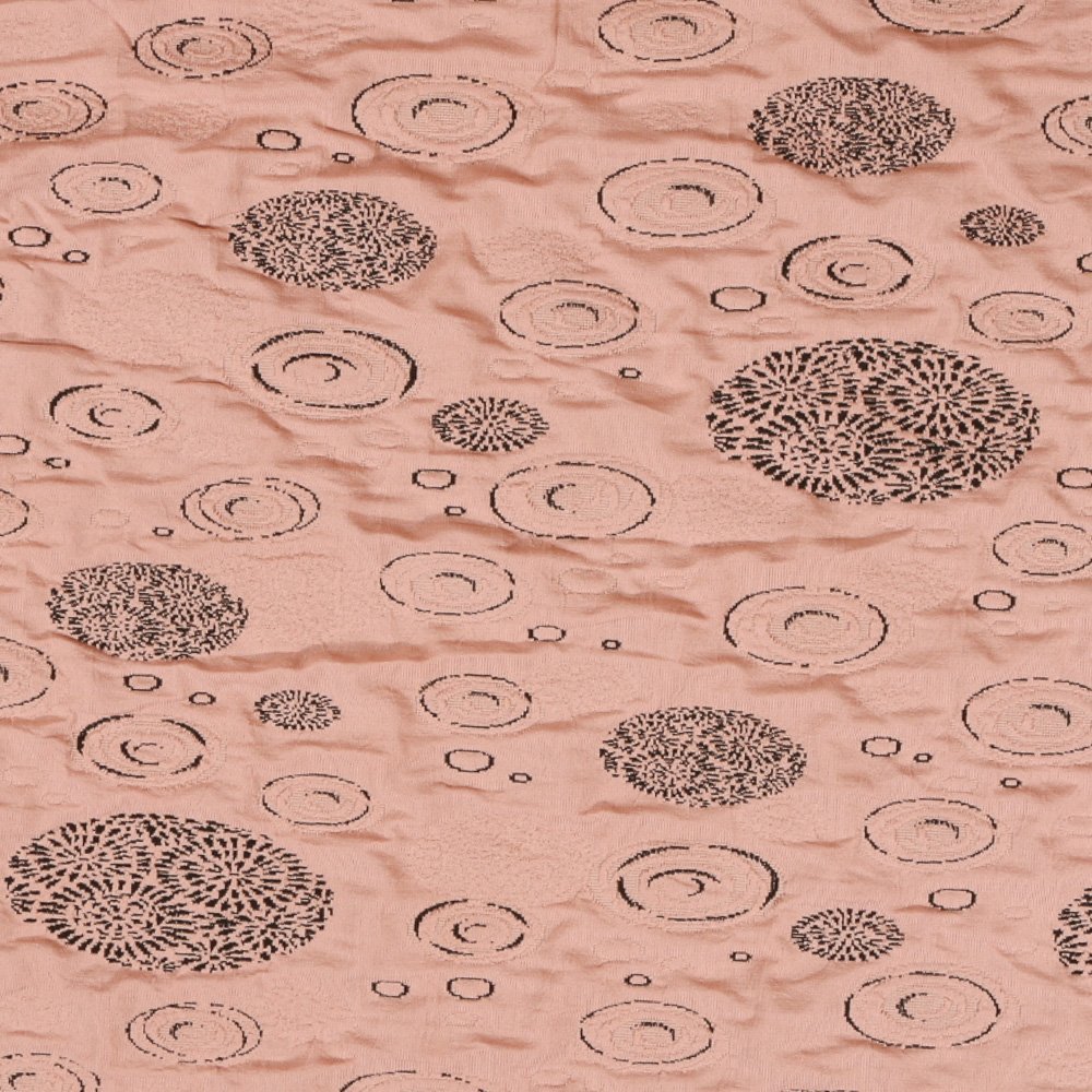 Tissu Jersey tissage relief motif Ripples Noir sur fond Saumon