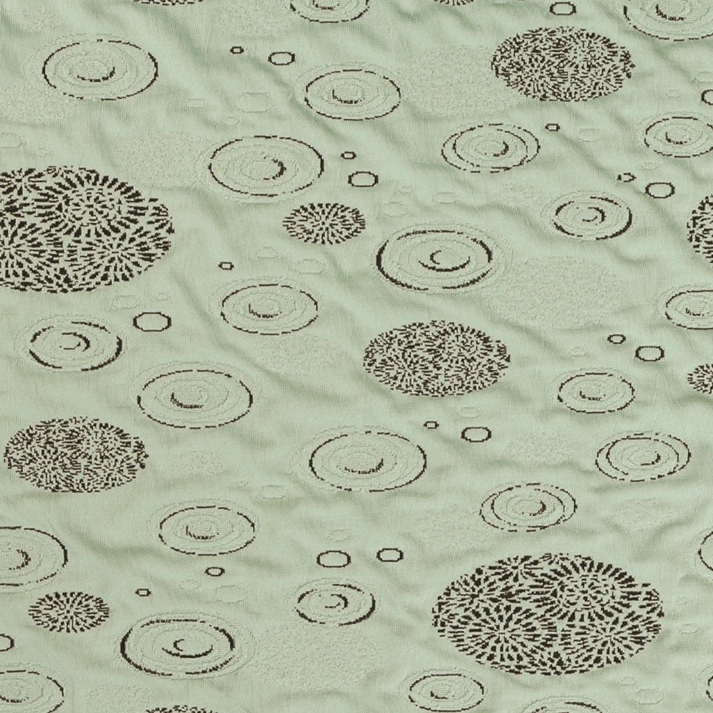 Tissu Jersey tissage relief motif Ripples Noir sur fond Vert Amande