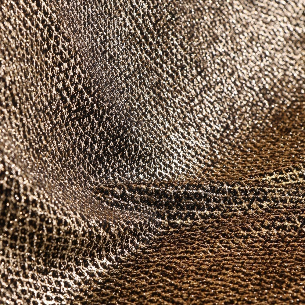 Tissu Jersey Motif serpent Or sur fond Noir