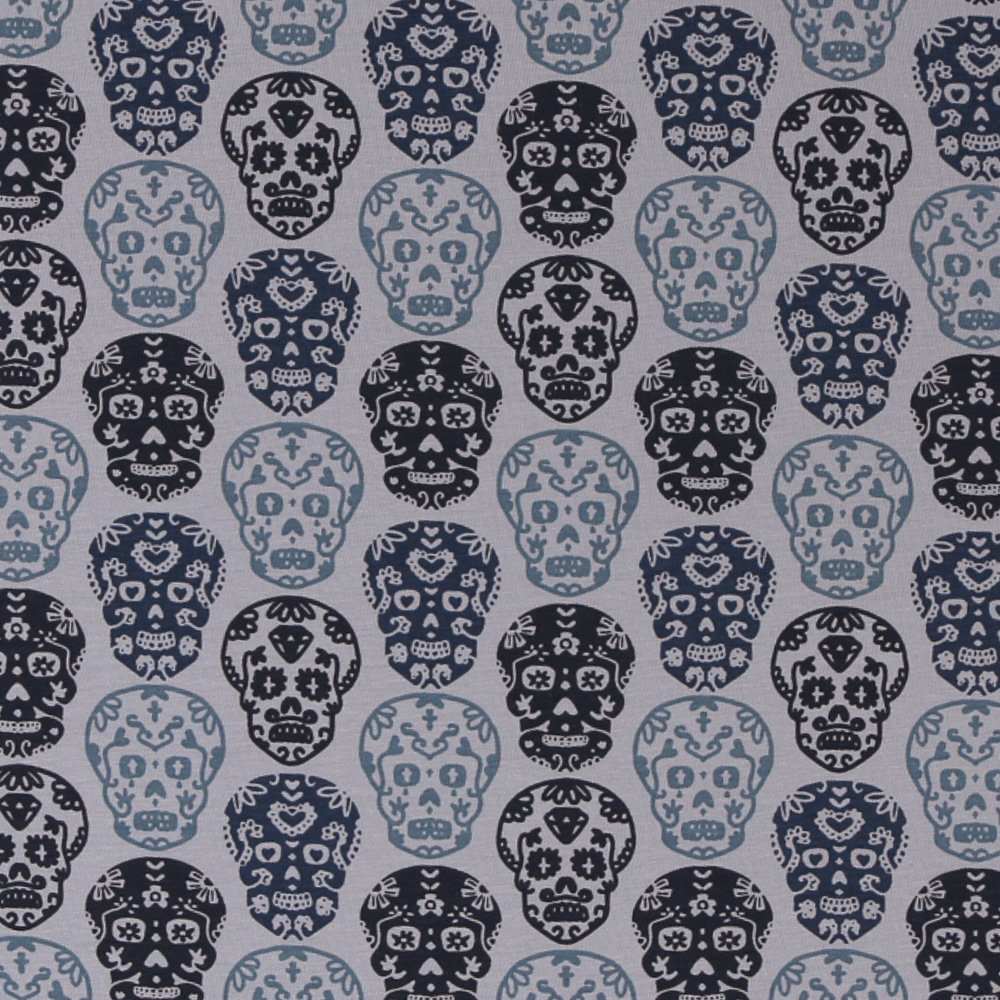 Tissu Jersey Coton Têtes de mort Bleues sur fond Bleu ancien