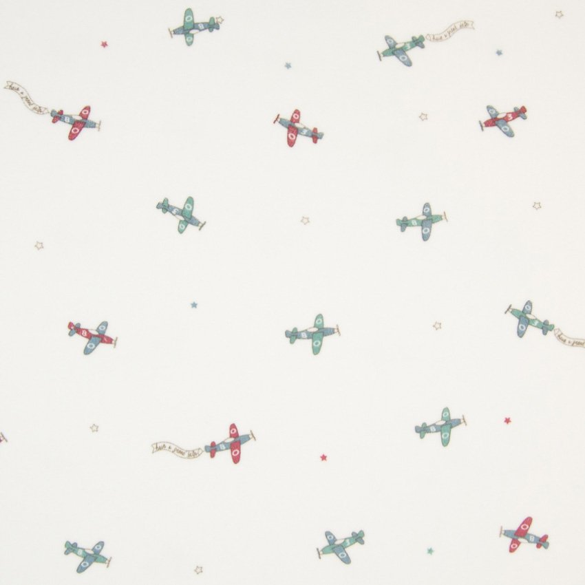 Tissu Jersey Velours imprimé Avions Rouges et verts sur fond Ecru