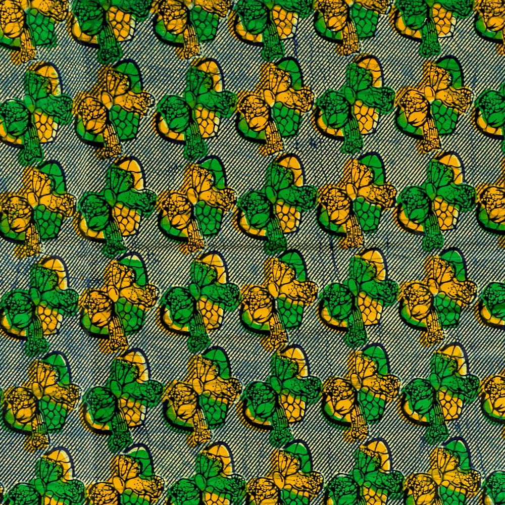 Tissu Wax Africain N°251 Coeurs et noeuds Verts et jaunes sur fond Vert