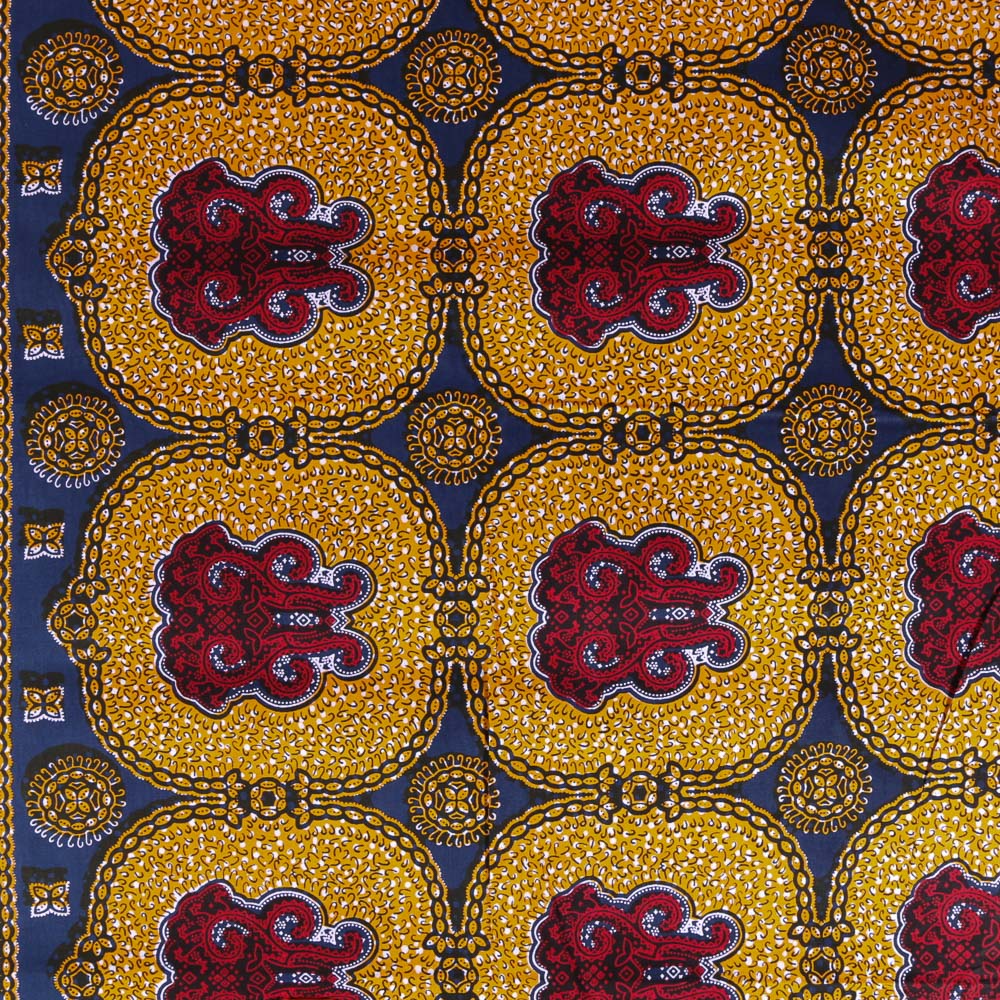 Tissu Wax Africain N°322 Motifs Africains Jaunes et rouges sur fond Bleu marine