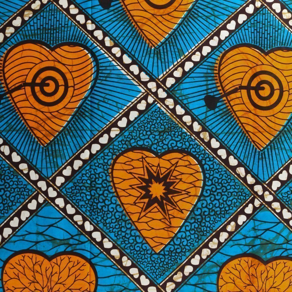 Tissu Wax Africain N°331 Coeurs et losanges Oranges et noirs sur fond Bleu