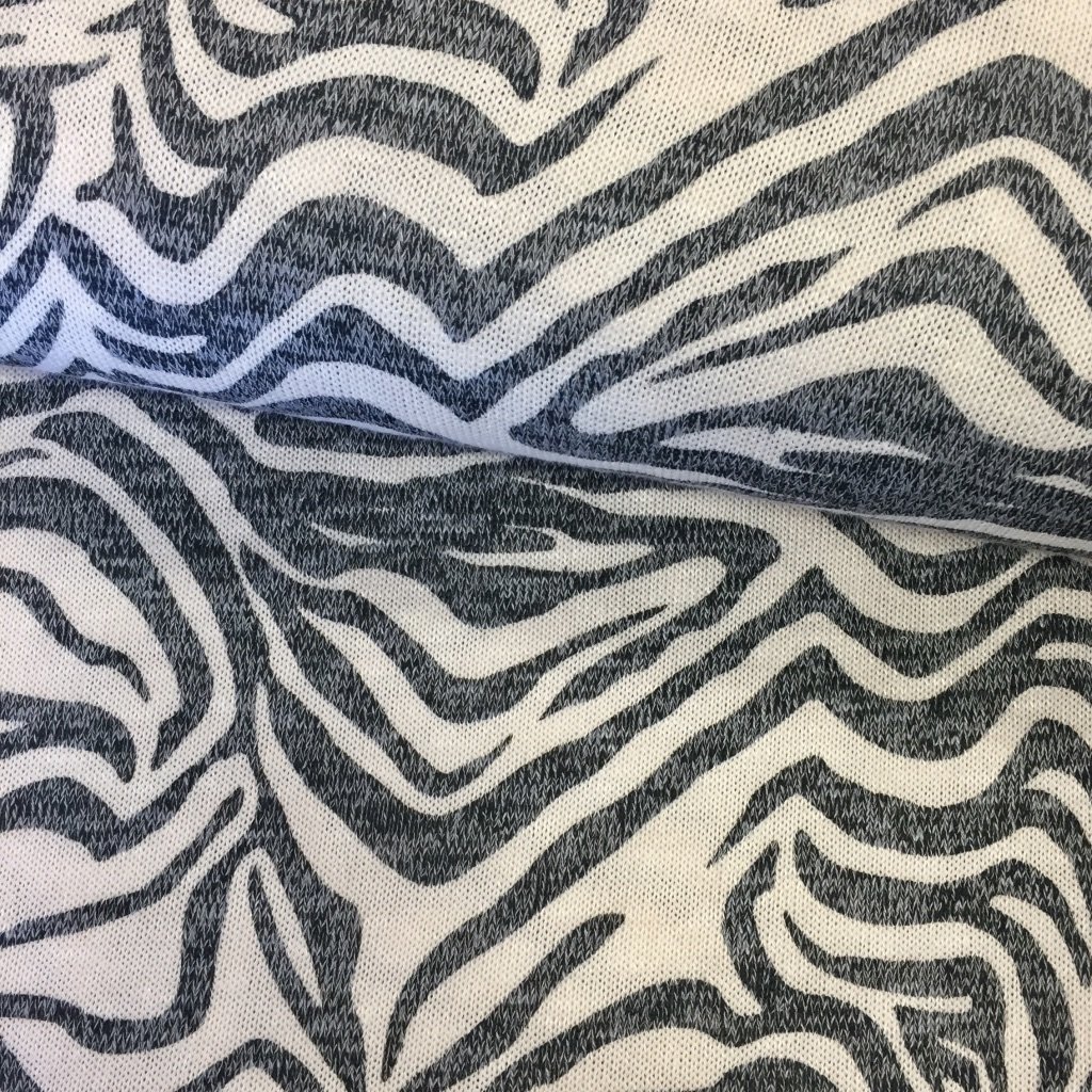 Tissu Maille légère Blanc Motifs zèbre Noirs