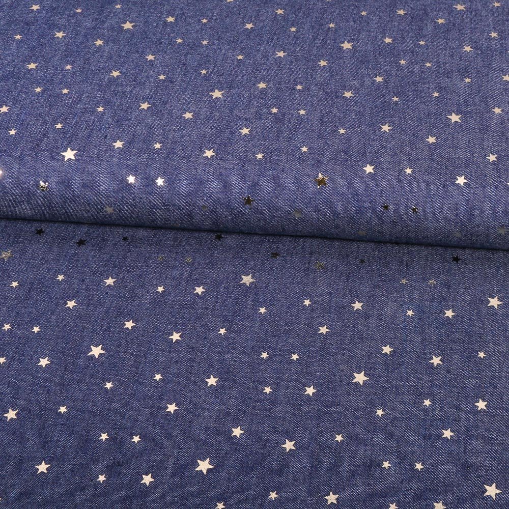 Tissu Chambray Petites étoiles Or sur fond Bleu jean foncé