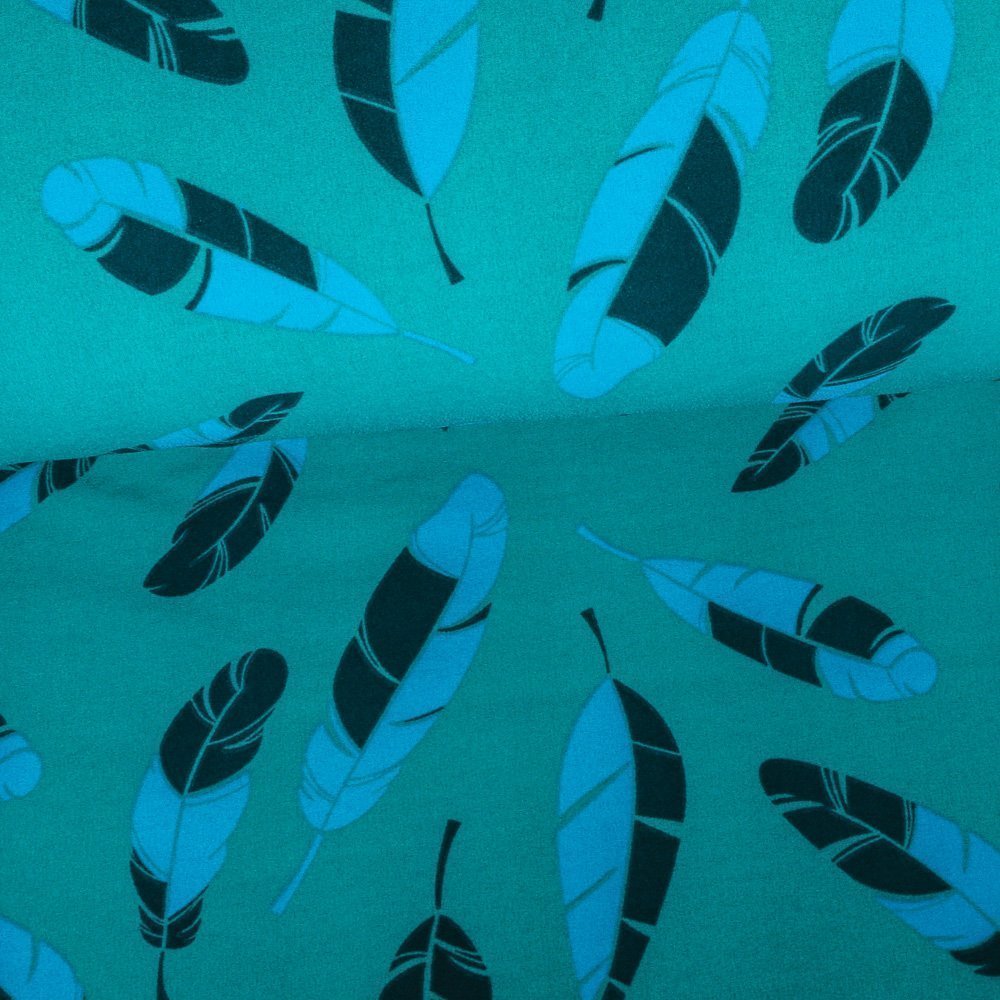 Tissu Néoprène Envers Polaire Plumes Bleues sur fond Vert émeraude