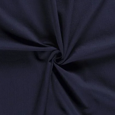 Tissu Gaze de coton Alvéolé sur fond Bleu marine - Par 10 cm