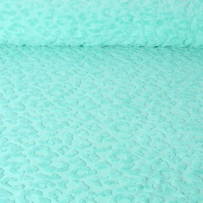 Tissu Maille motif léopard éponge sur fond Vert menthe - Par 10 cm