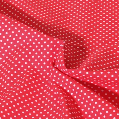 Tissu Popeline de Coton  Carmella à pois blanc sur fond Rouge - Par 10 cm