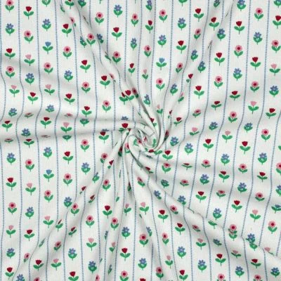 Tissu Jersey Coton imprimé Rayures fleuris Melodie vert sur fond Blanc - Par 10 cm