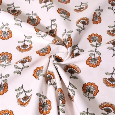 Tissu Toile de Coton Canvas Poppy Fleuris oranges et vertes sur fond Ecru - Par 10 cm