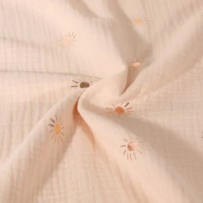 Tissu Double gaze de Coton Motif soleil foil sur fond Beige - Par 10 cm