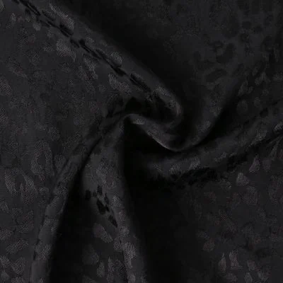 Tissu Jacquard de Viscose Abyssia fauve uni Noir - Par 10 cm