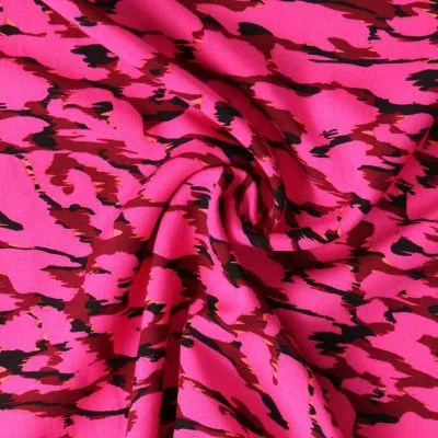 Tissu Viscose  Cobalia motifs abstraits Noirs sur fond Rose fuchsia - Par 10 cm