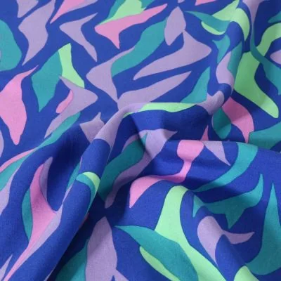 Tissu Viscose lenzing EcoVero Flammes Tropicales sur fond Bleu roi - Par 10 cm