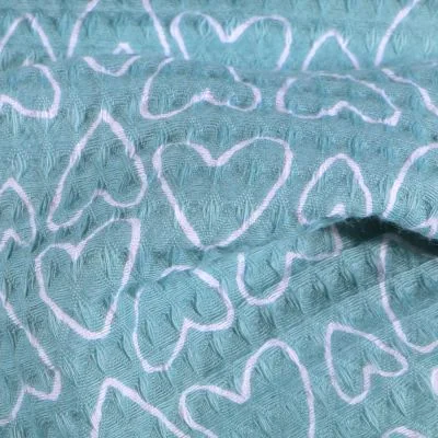 Tissu Nid d&#039;abeille imprimé Cœurs blancs sur fond Bleu - Par 10 cm