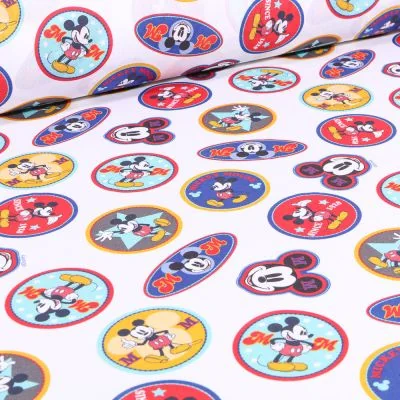 Tissu Coton imprimé sous licence Mickey Mouse sur fond Blanc - Par 10 cm