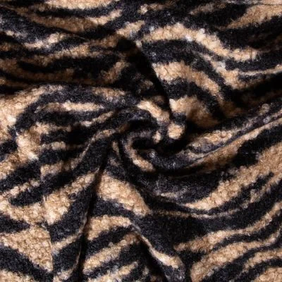 Tissu Bouclette Polyester Zebré sur fond Beige - Par 10 cm