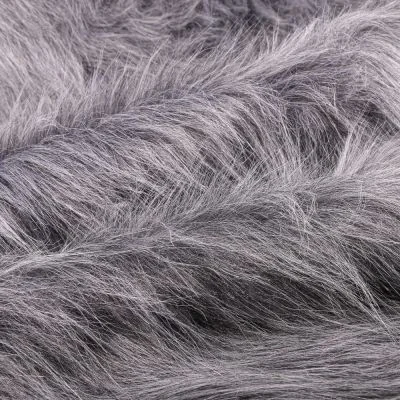 Tissu Fausse fourrure Fantasia sur fond Gris - Par 10 cm