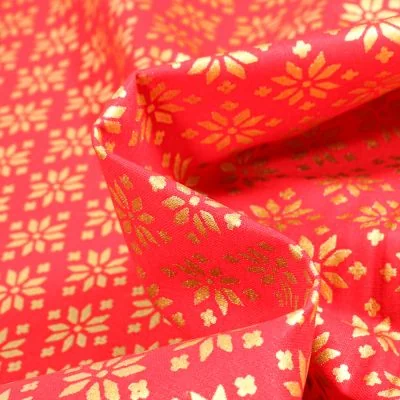Tissu Coton imprimé Bio Beaux flocons dorés sur fond Rouge - Par 10 cm
