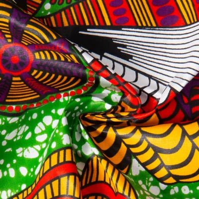 Tissu Wax africain n°912 sur fond Vert - Par 10 cm