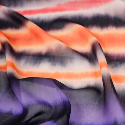 Tissu Mousseline rayé orange et violet sur fond Noir - Par 10 cm