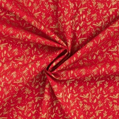 Tissu Coton imprimé motifs de Noël dorés sur fond Rouge - Par 10 cm