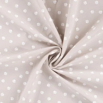 Tissu Popeline de Coton  empreintes de pattes blanches Zumi sur fond Taupe - Par 10 cm