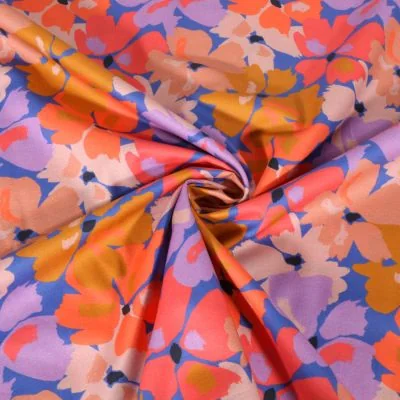 Tissu Voile de Coton digital Motif floral lilas, ocre et pêche sur fond Bleu roi - Par 10 cm