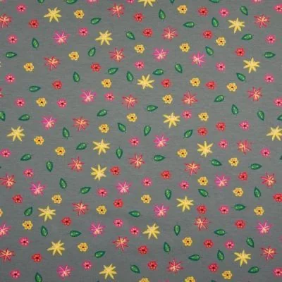 Tissu Jersey Coton Feuilles  et fleurs jaunes rose et vertes sur fond Gris foncé - Par 10 cm