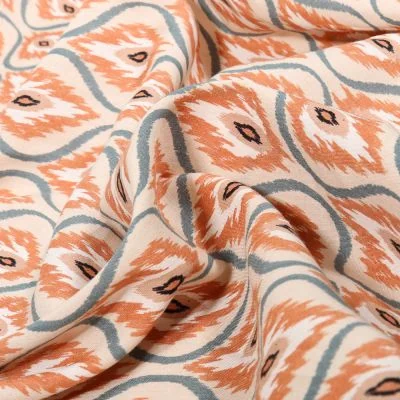 Tissu Voile de Viscose et Coton Ethny sur fond Beige - Par 10 cm