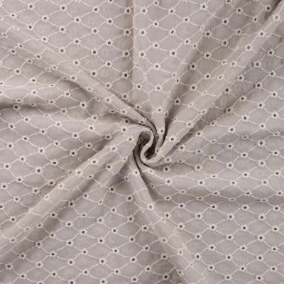 Tissu Gaze de Coton motifs brodés sur fond Beige sable - Par 10 cm